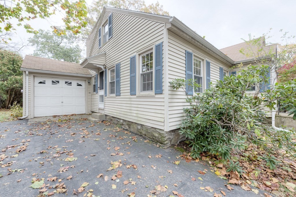 13 Westbrook Road Worcester, MA 01602 - Photo 4 of 41 a view of a house with a yard and garage