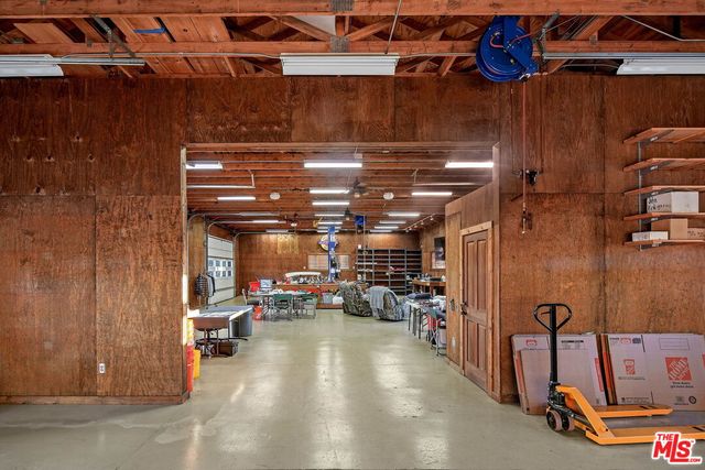 an aerial view of a house with a garden