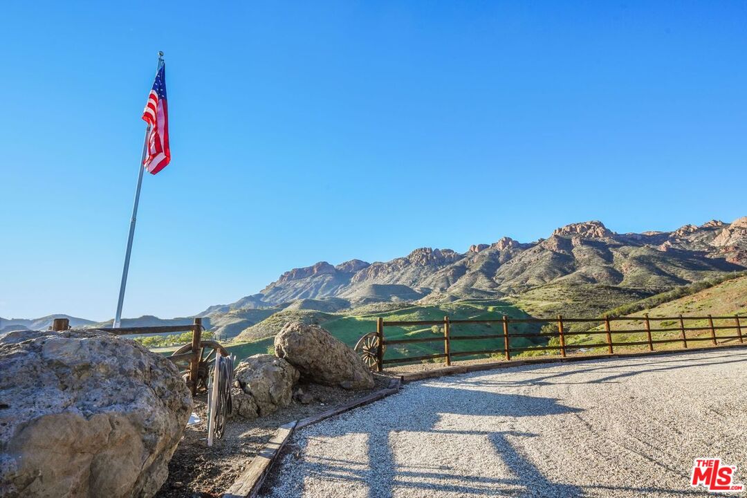 12486 Yerba Buena Road Malibu, CA 90265 - Photo 40 of 68 a view of a road with a ocean view