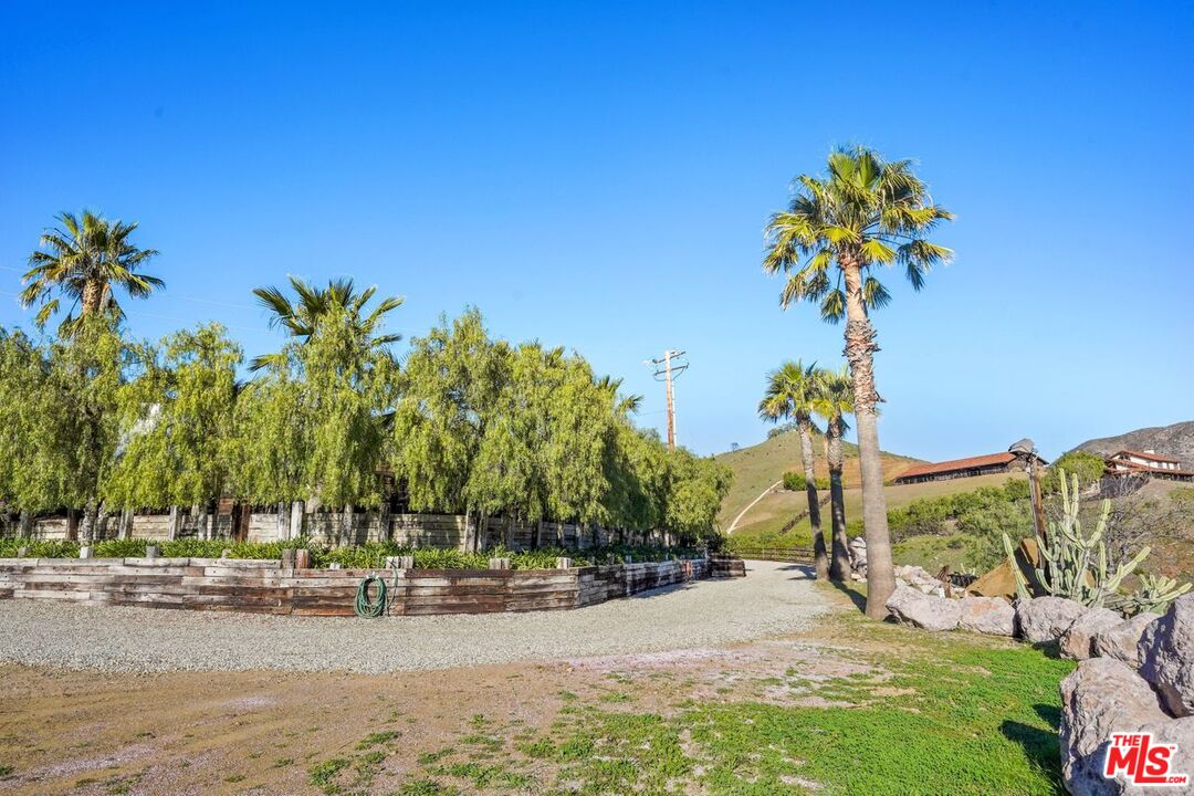 12486 Yerba Buena Road Malibu, CA 90265 - Photo 53 of 68 a view of a street with a building in the background