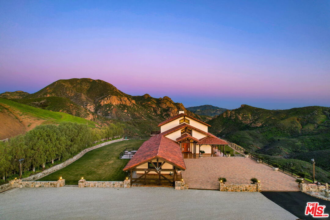 12486 Yerba Buena Road Malibu, CA 90265 - Photo 55 of 68 an aerial view of a house with a street