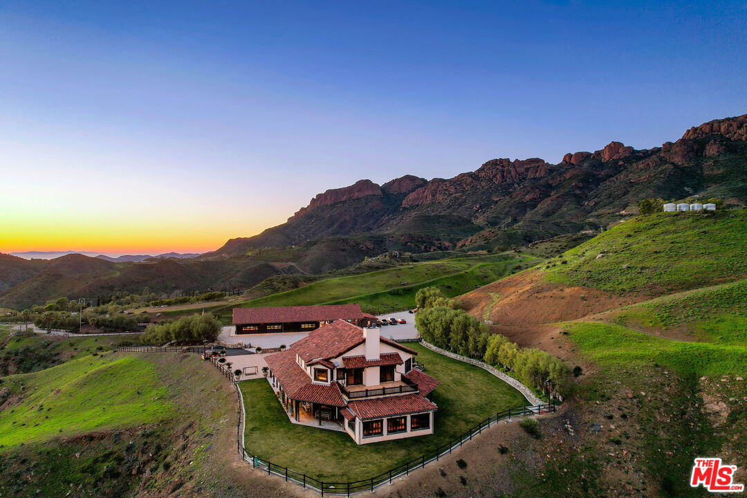 12486 Yerba Buena Road Malibu, CA 90265 - Photo 61 of 68 an aerial view of a house with mountain view