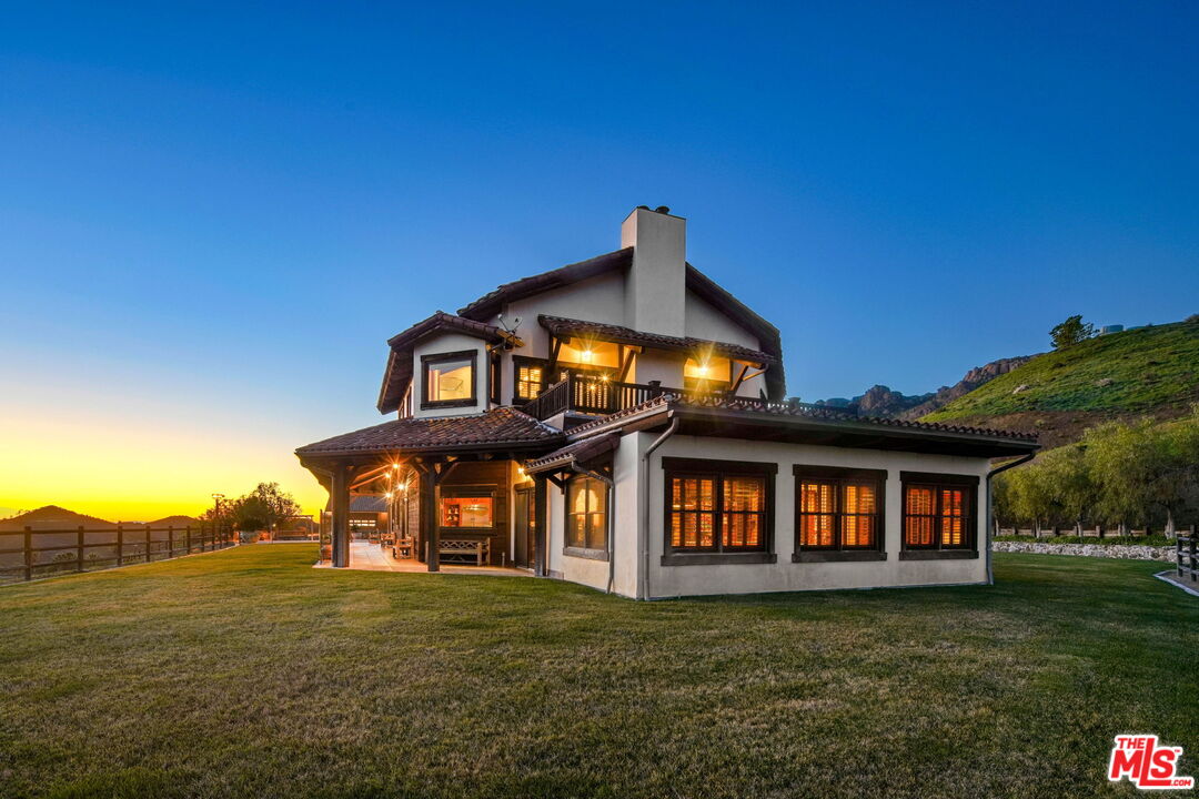 12486 Yerba Buena Road Malibu, CA 90265 - Photo 63 of 68 a front view of a house with a garden