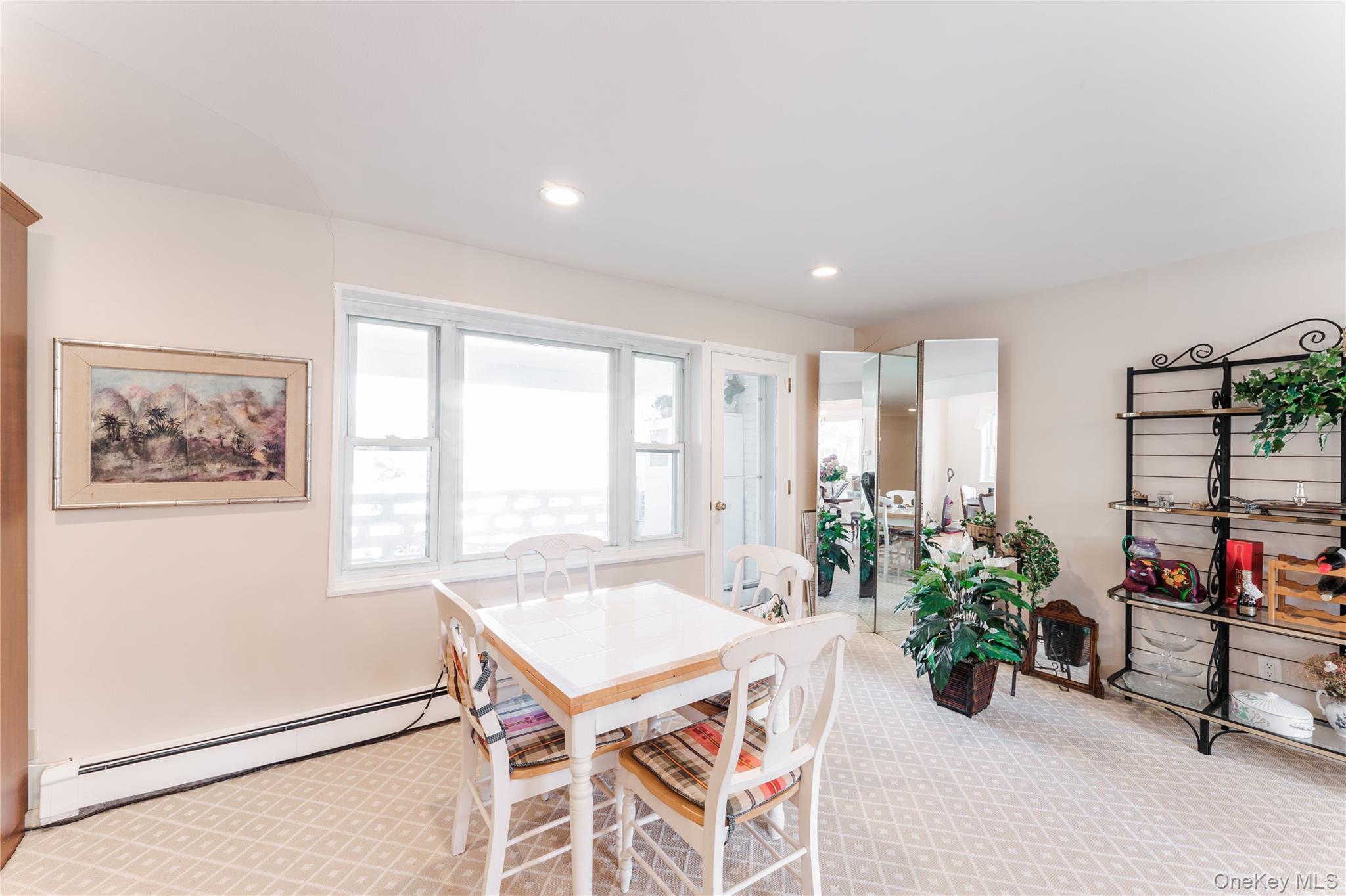 200 South Middle Neck Road, Unit F6 Great Neck, NY 11021 - Photo 13 of 16 a view of a livingroom with furniture and a window