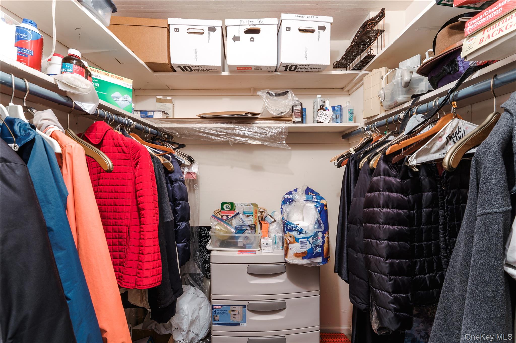 200 South Middle Neck Road, Unit F6 Great Neck, NY 11021 - Photo 15 of 16 a view of walk in closet with clothes and shoes