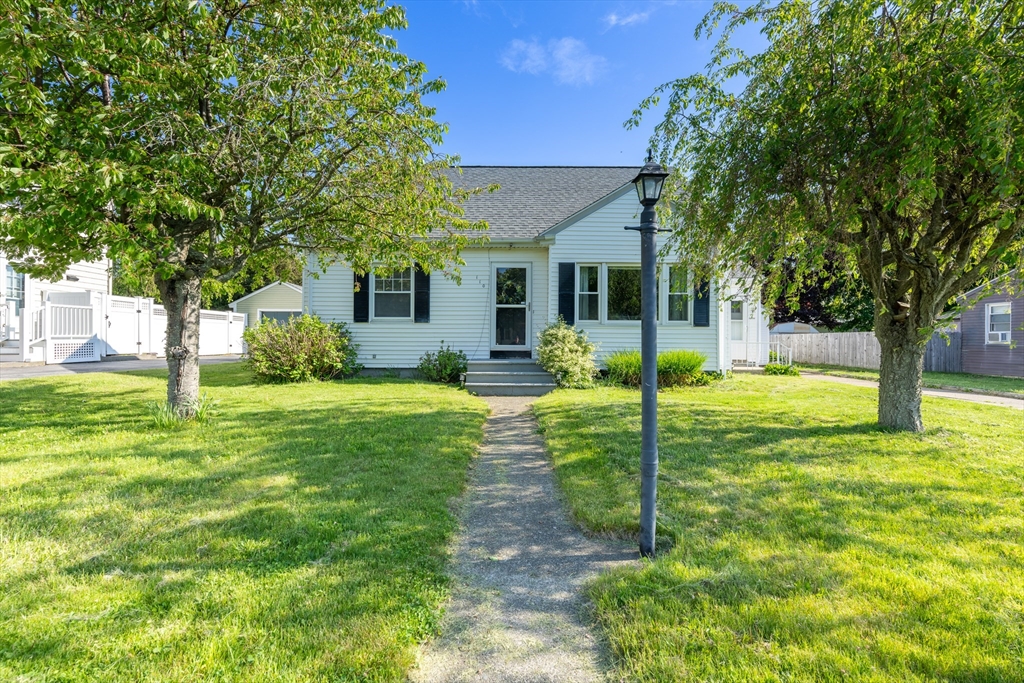 110 James M Beardsworth Road Tiverton, RI 02878 - Photo 1 of 26 a view of a house with big yard and plants
