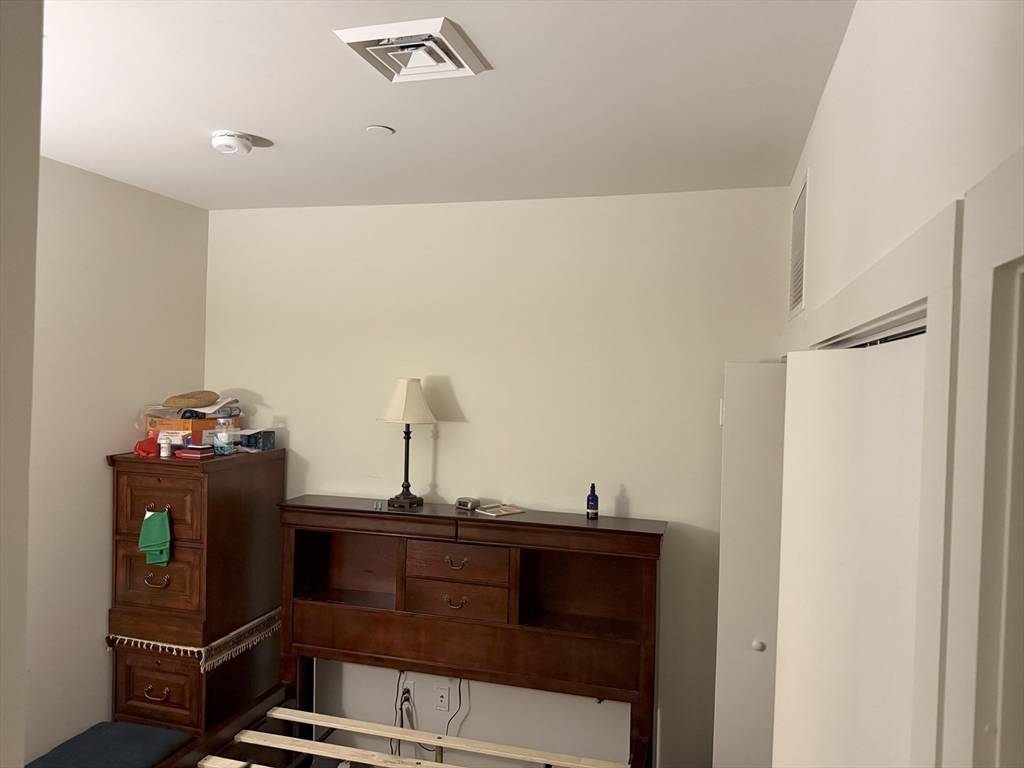 45 1st Avenue, Unit 111 Boston, MA 02129 - Photo 3 of 8 a view of workspace with cabinet