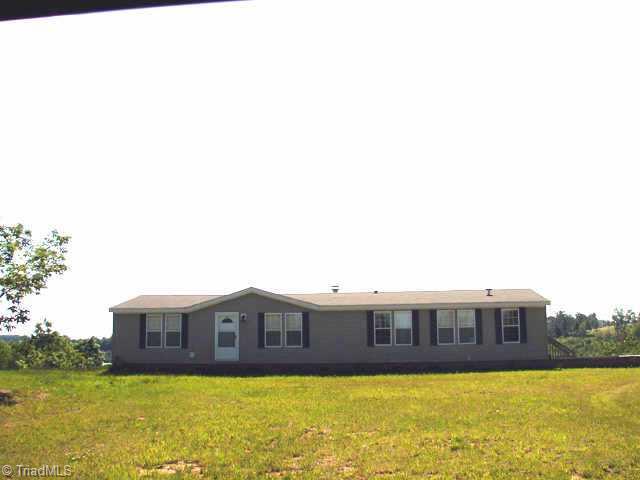 384 Wagoner Ridge Road Ennice, NC 28623 - Photo 1 of 9 Exterior Front.