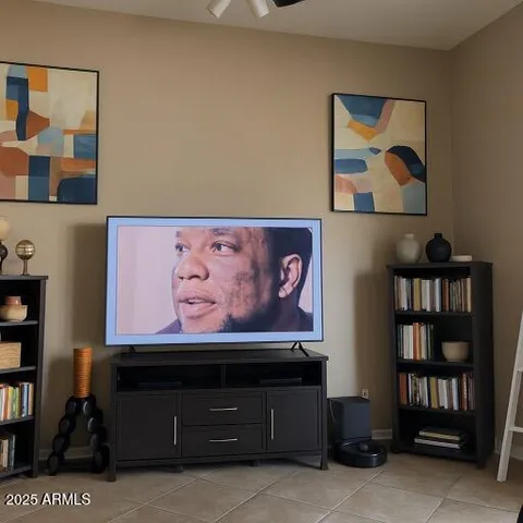 a living room with furniture and window