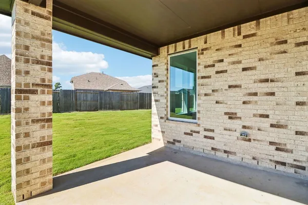 a view of swimming pool from a balcony