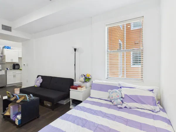 a living room with furniture and window