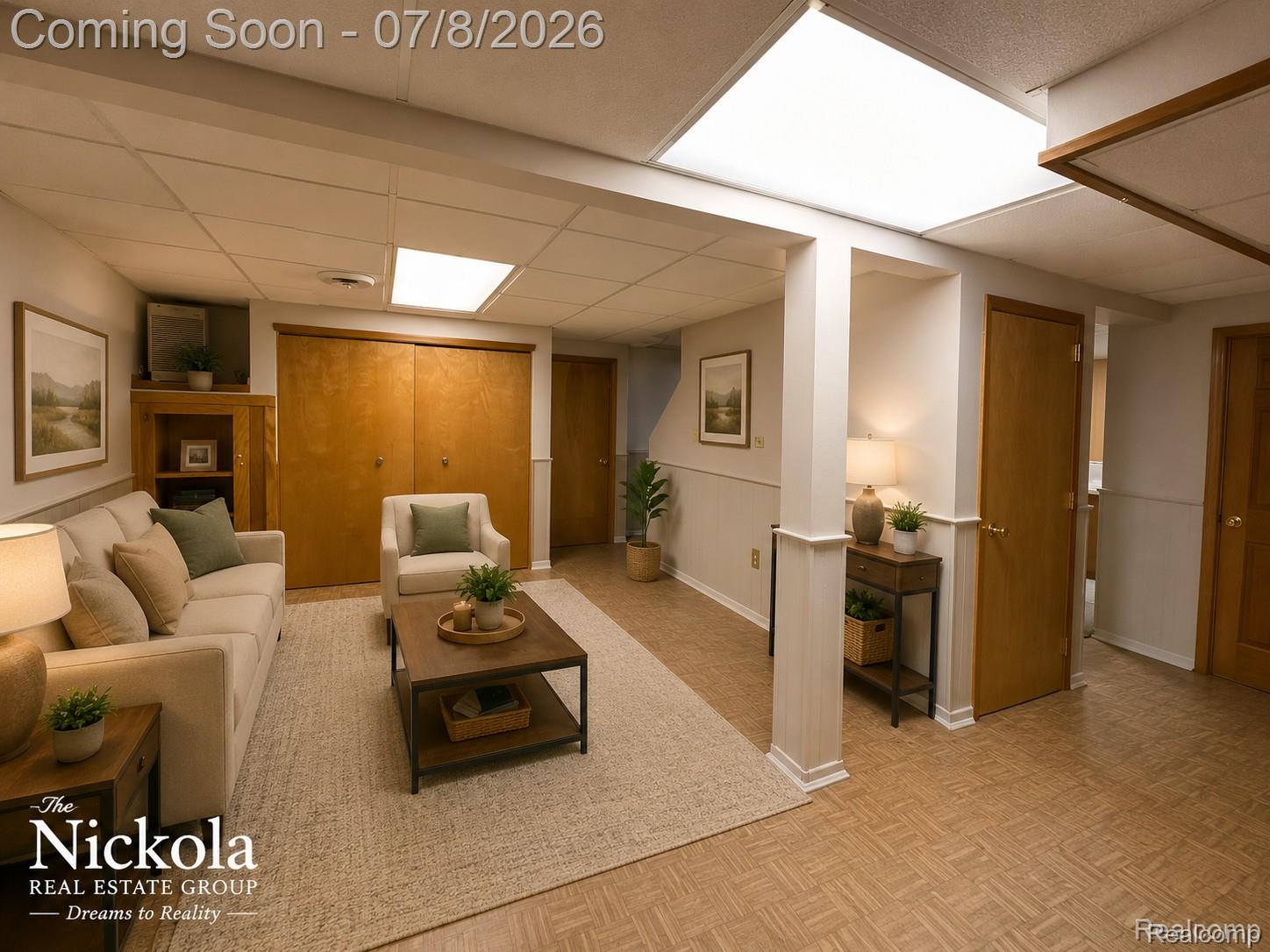 414 Whitney Drive Rochester, MI 48307 - Photo 28 of 30 Finished lower level featuring recessed lighting, paneled accent walls, and wood-finish flooring