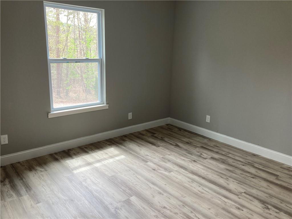 100 A Dickerson Road Dahlonega, GA 30533 - Photo 13 of 15 an empty room with a window