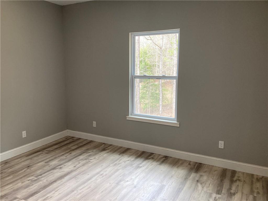 100 A Dickerson Road Dahlonega, GA 30533 - Photo 14 of 15 an empty room with a window