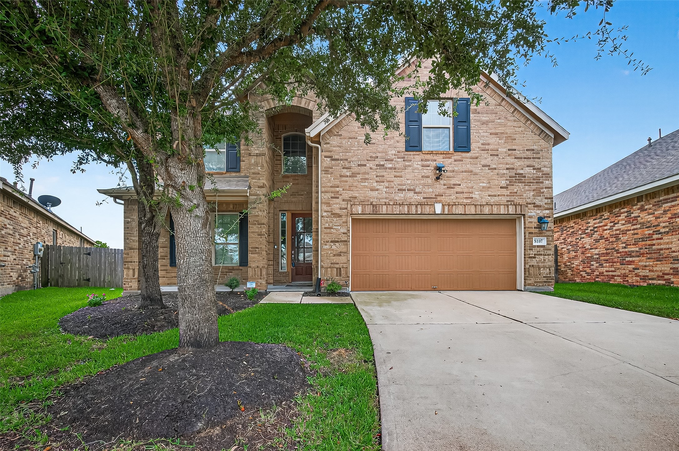 8107 Lockridge Terrace Lane Cypress, TX 77433 - Photo 2 of 50 The charming arched portico beckons you inside, offering a lovely welcome to family and friends.