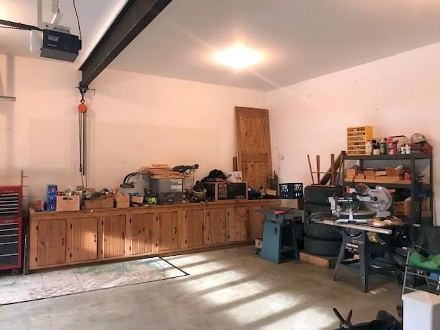 203 Waterville Road South China, ME 04358 - Photo 32 of 33 Garage interior has storage for...