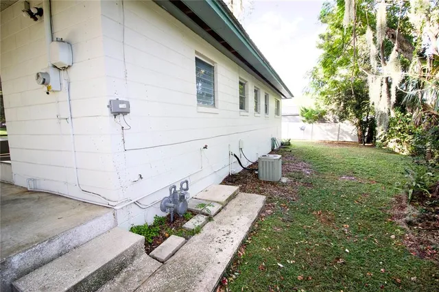 a view of a back yard of the house