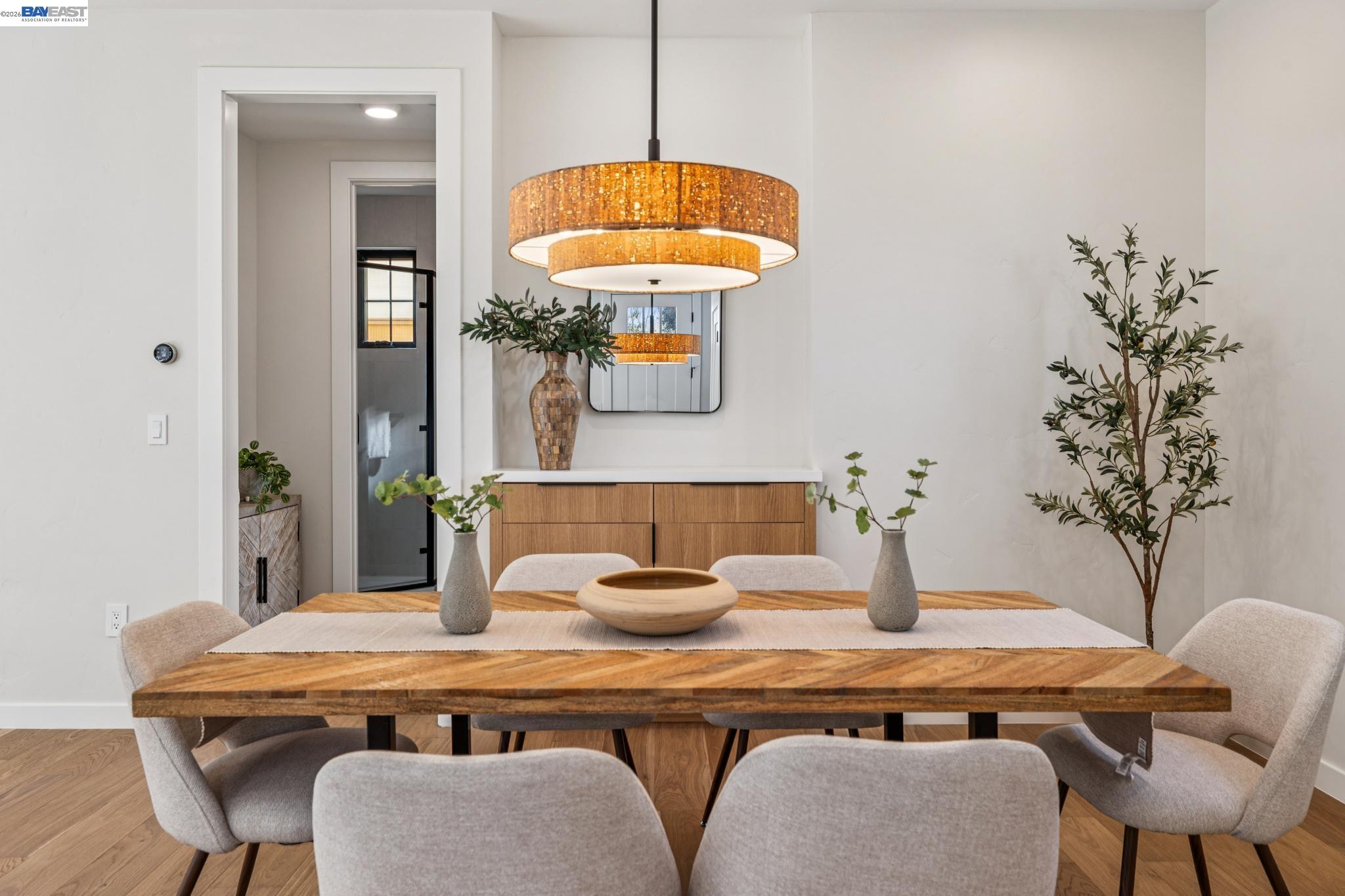 1142 Dwight Way Berkeley, CA 94702 - Photo 17 of 60 a dining room with furniture and wooden floor