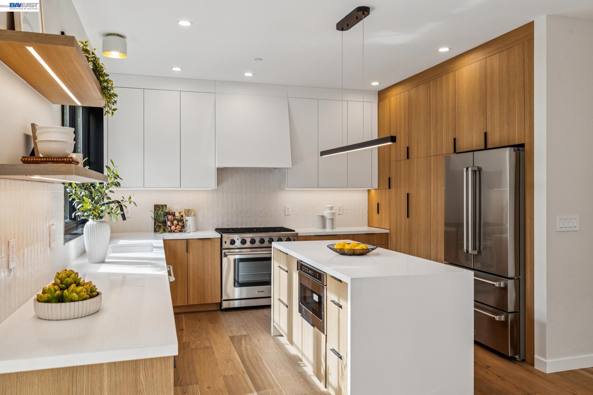 1142 Dwight Way Berkeley, CA 94702 - Photo 21 of 60 a kitchen with stainless steel appliances granite countertop a refrigerator a stove and a sink
