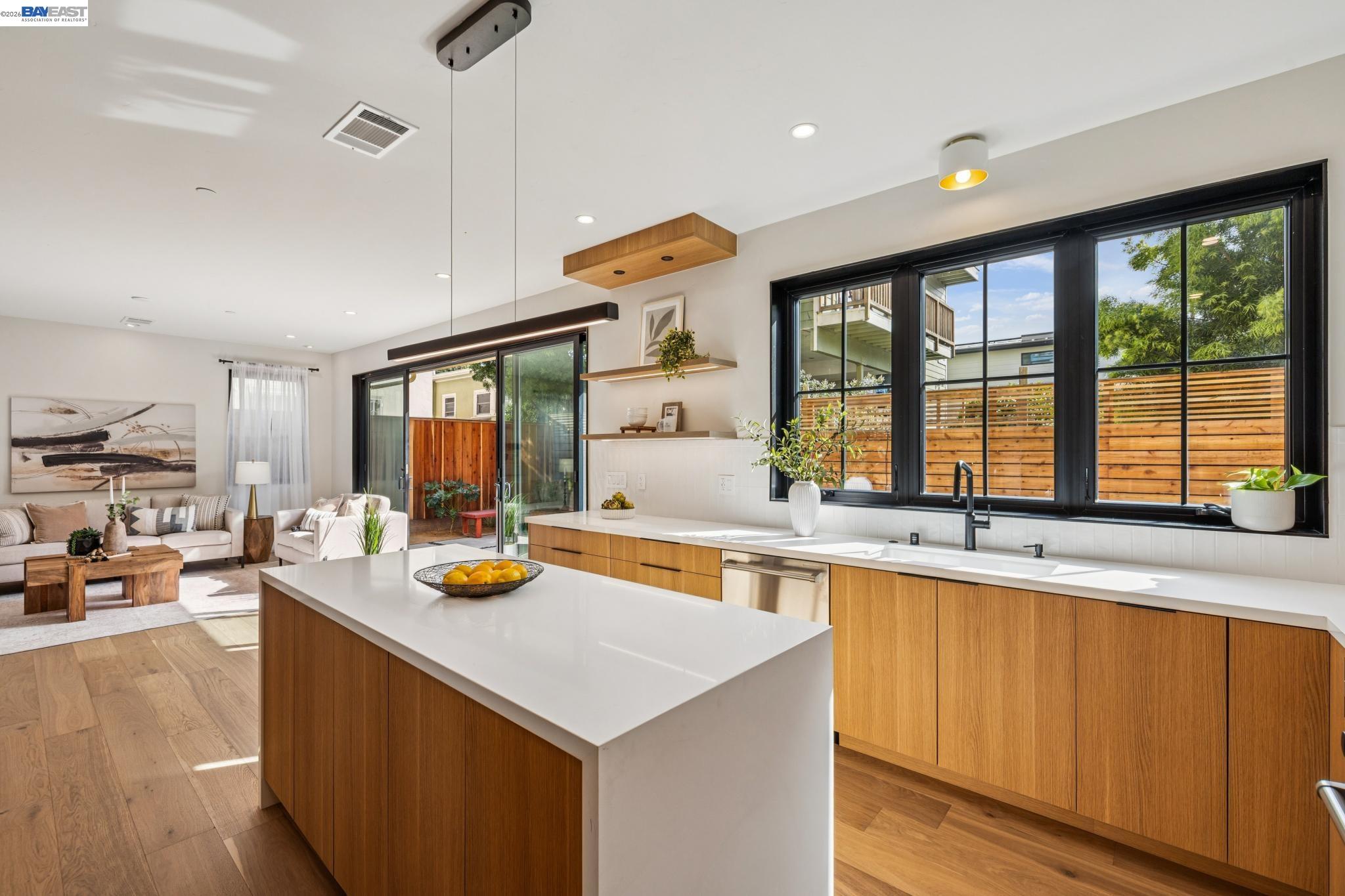 1142 Dwight Way Berkeley, CA 94702 - Photo 23 of 60 a large kitchen with a large window and a counter space