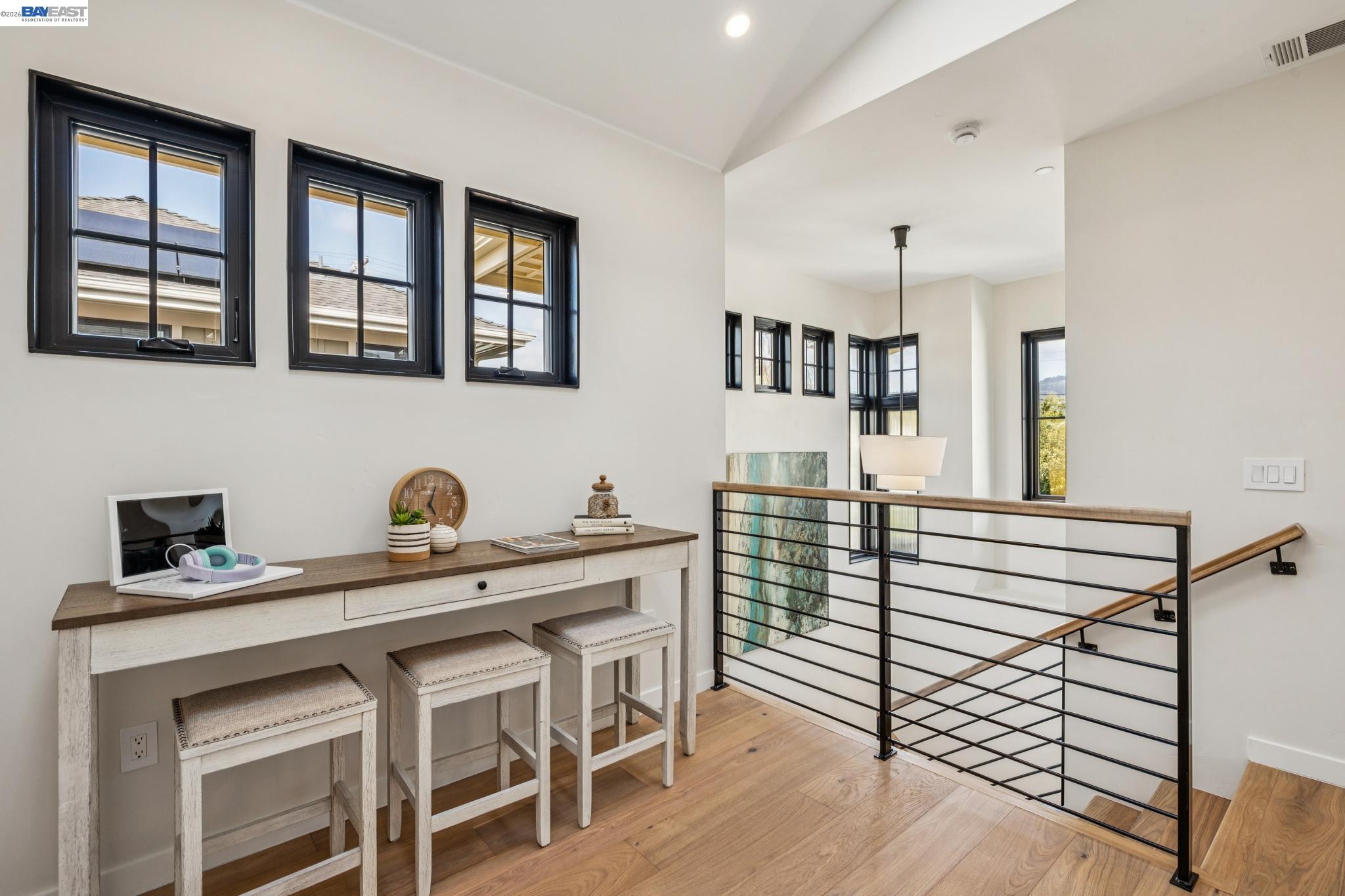 1142 Dwight Way Berkeley, CA 94702 - Photo 33 of 60 a kitchen with a table chairs refrigerator and cabinets