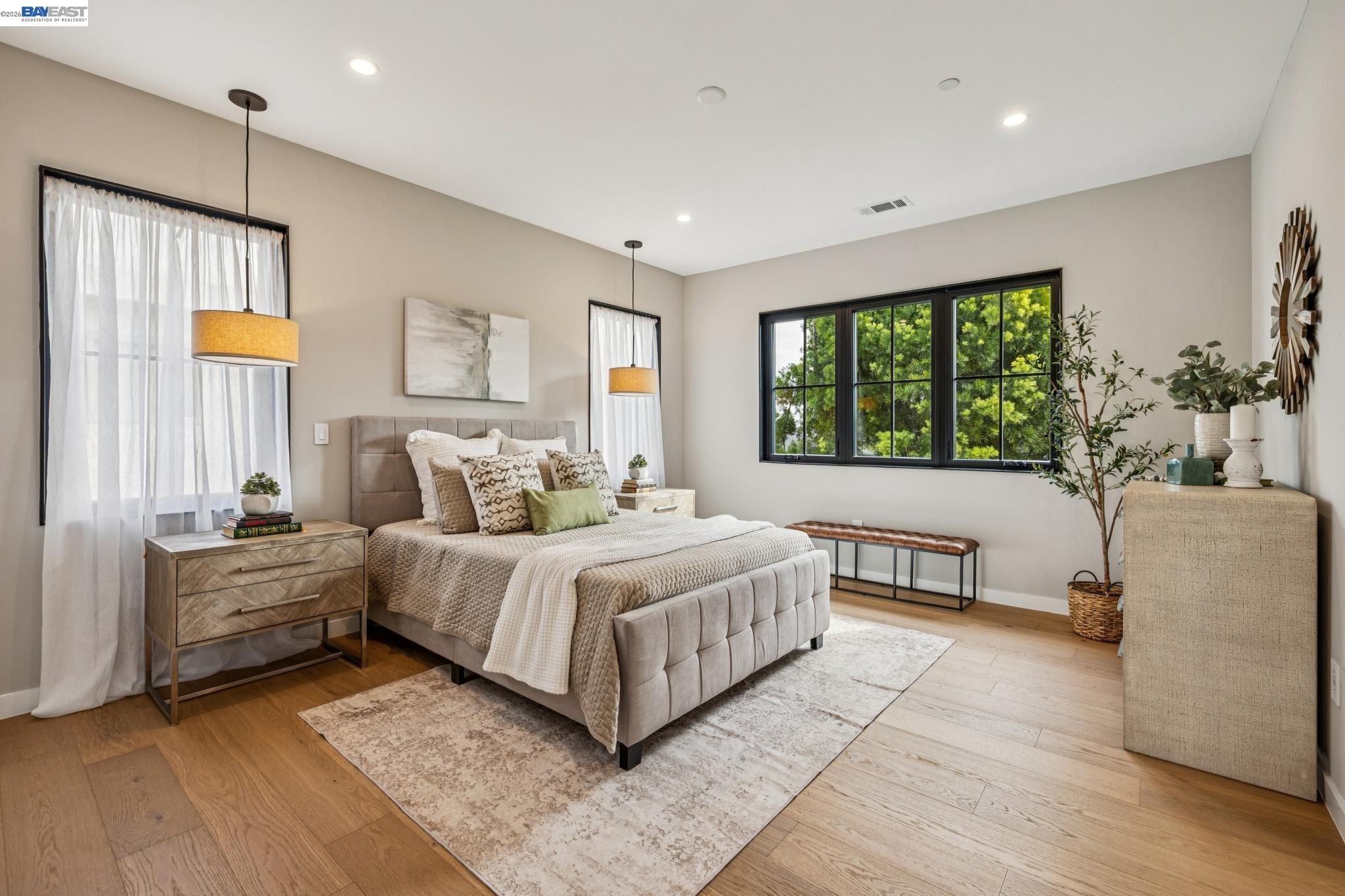 1142 Dwight Way Berkeley, CA 94702 - Photo 37 of 60 a bedroom with a bed and a large window