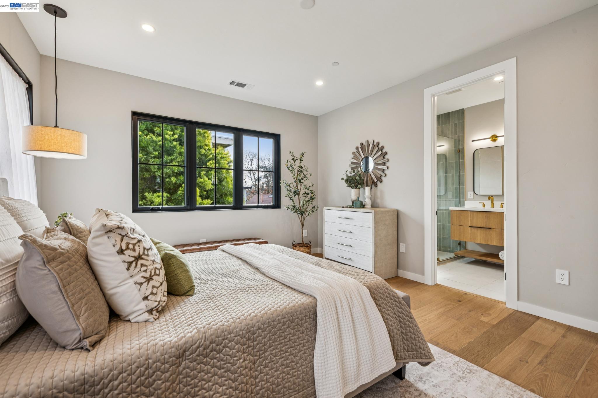 1142 Dwight Way Berkeley, CA 94702 - Photo 38 of 60 a bedroom with a bed and a large window