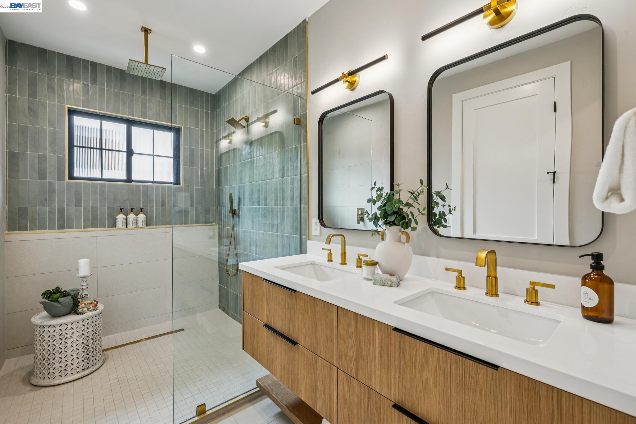 1142 Dwight Way Berkeley, CA 94702 - Photo 40 of 60 a bathroom with a tub sink and mirror