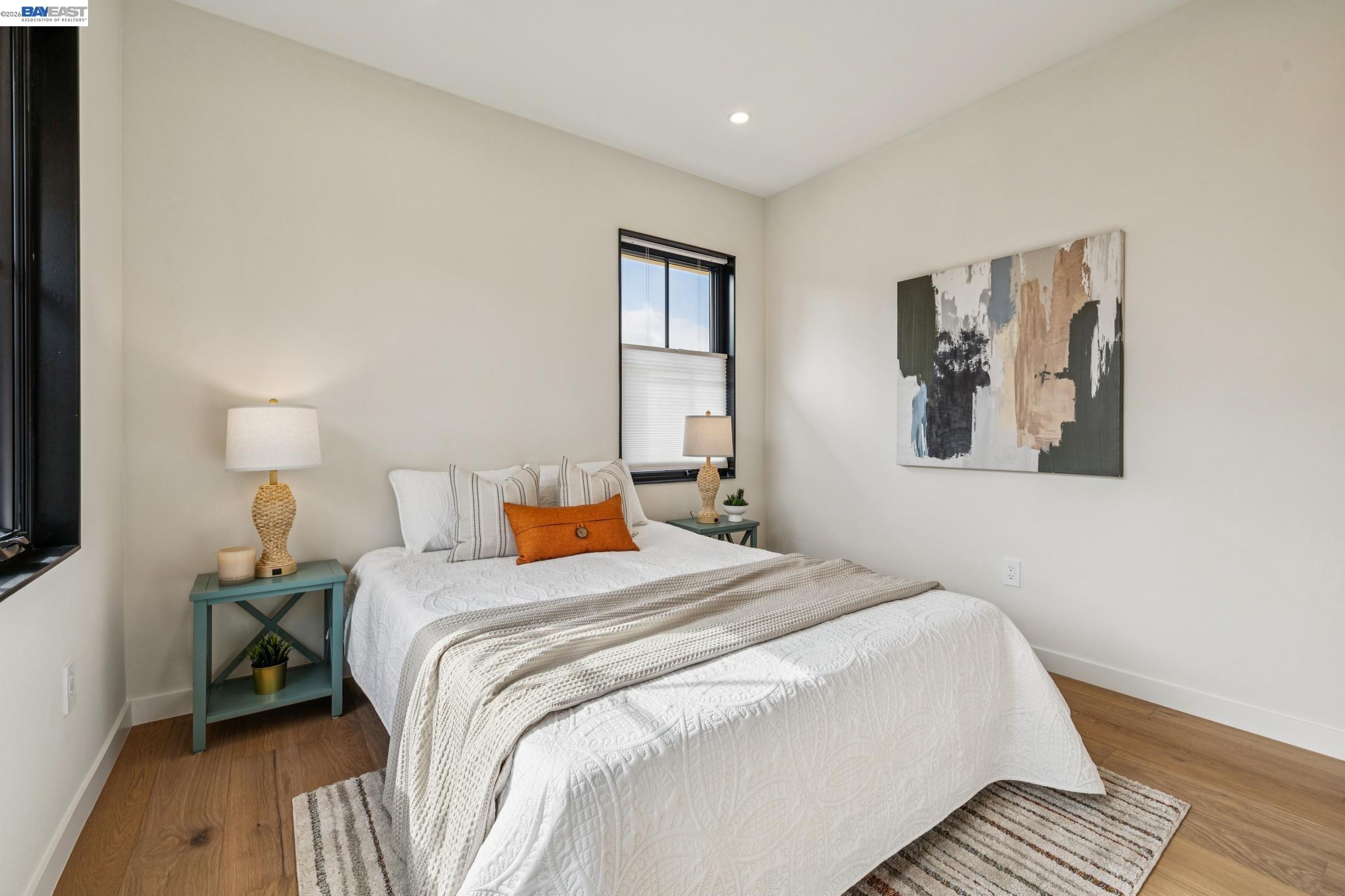 1142 Dwight Way Berkeley, CA 94702 - Photo 45 of 60 a bedroom with bed and a night stand