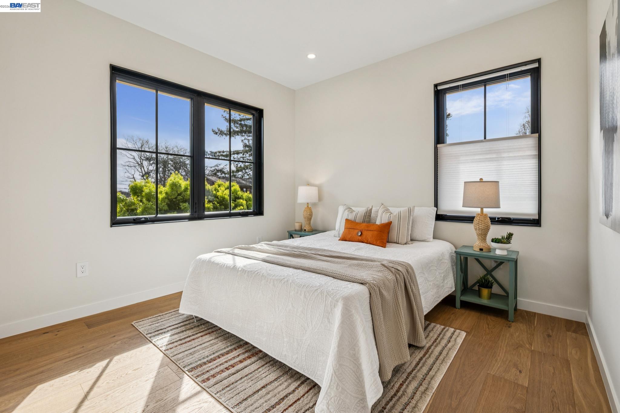 1142 Dwight Way Berkeley, CA 94702 - Photo 46 of 60 a bedroom with a bed and a window