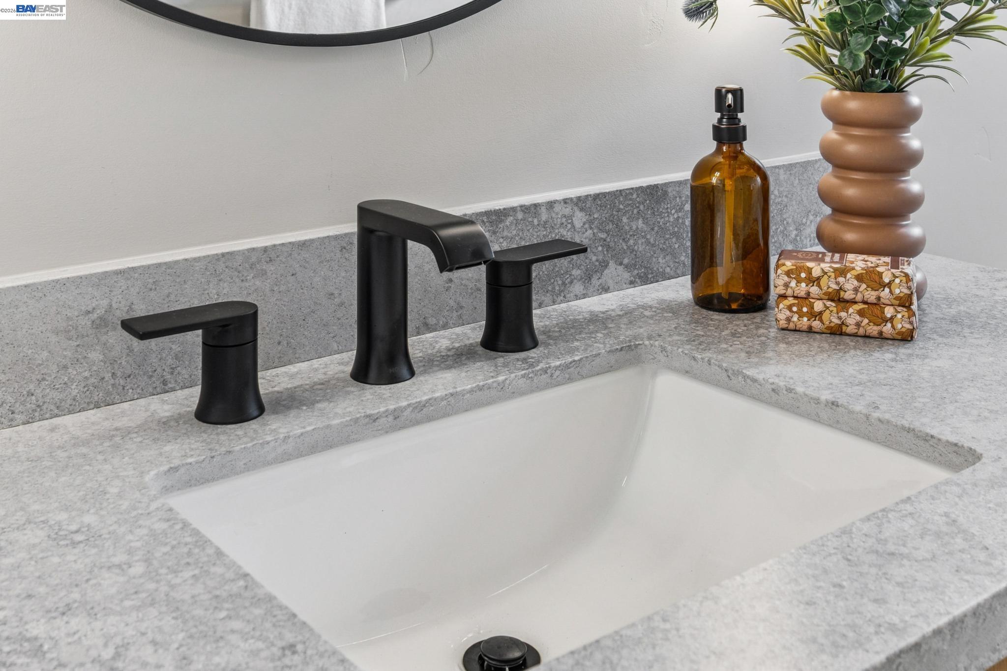 1142 Dwight Way Berkeley, CA 94702 - Photo 49 of 60 a bathroom with a sink and a mirror