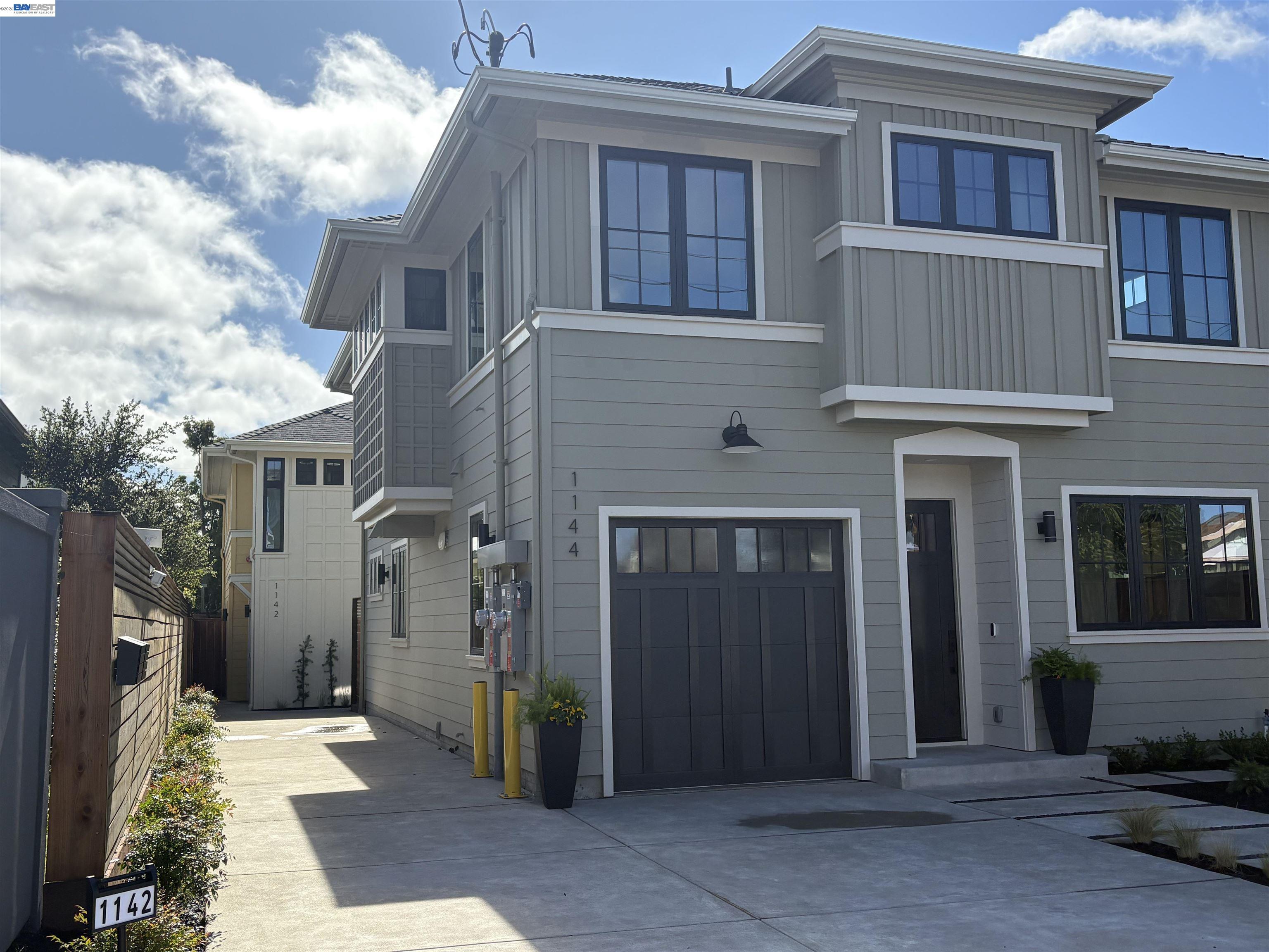 1142 Dwight Way Berkeley, CA 94702 - Photo 57 of 60 a front view of a house with a garage