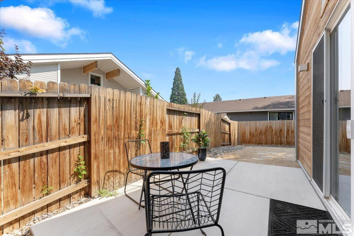 1219 Lander Street Reno, NV 89509 - Photo 15 of 18 a backyard of a house with table and chairs