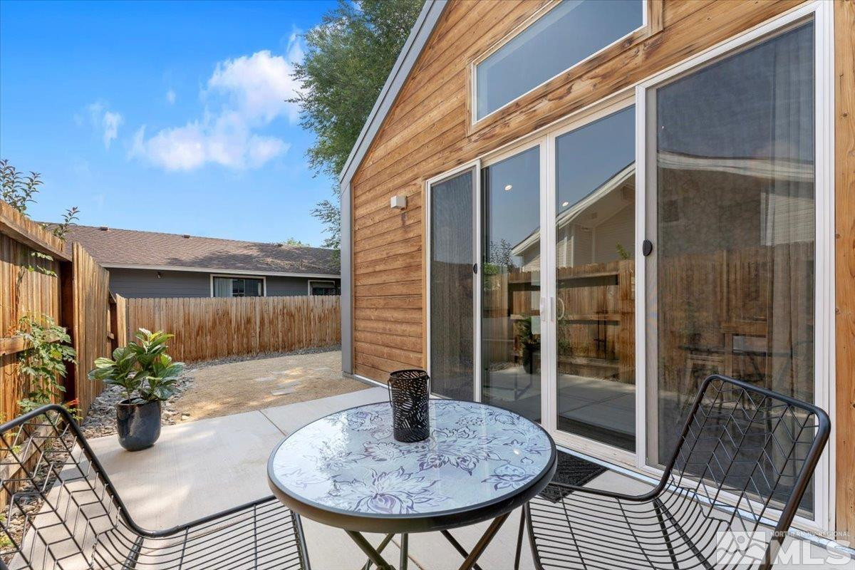 1219 Lander Street Reno, NV 89509 - Photo 3 of 18 a house view with a seating space and garden view
