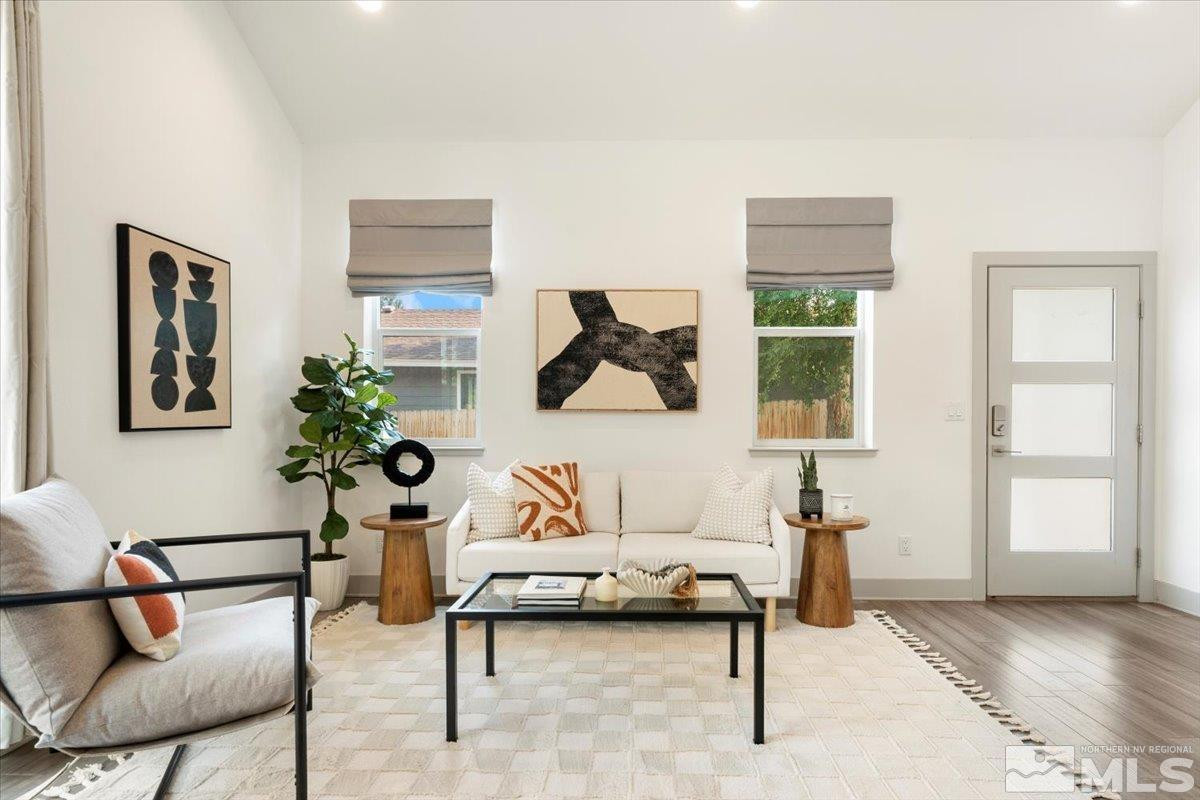 1219 Lander Street Reno, NV 89509 - Photo 6 of 18 a living room with furniture and wooden floor