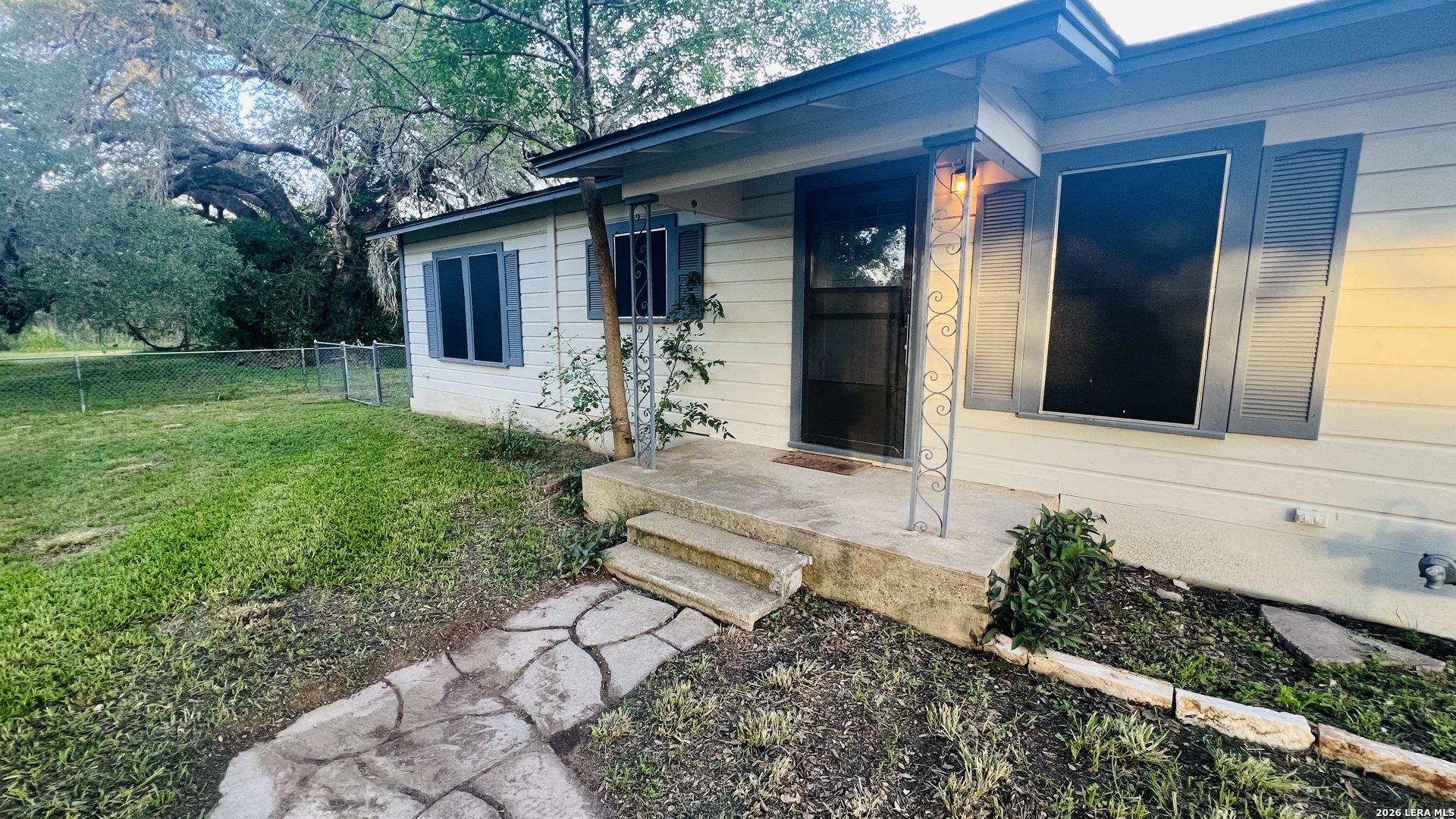 149 South Carroll Street Poth, TX 78147 - Photo 1 of 28 a front view of a house with garden
