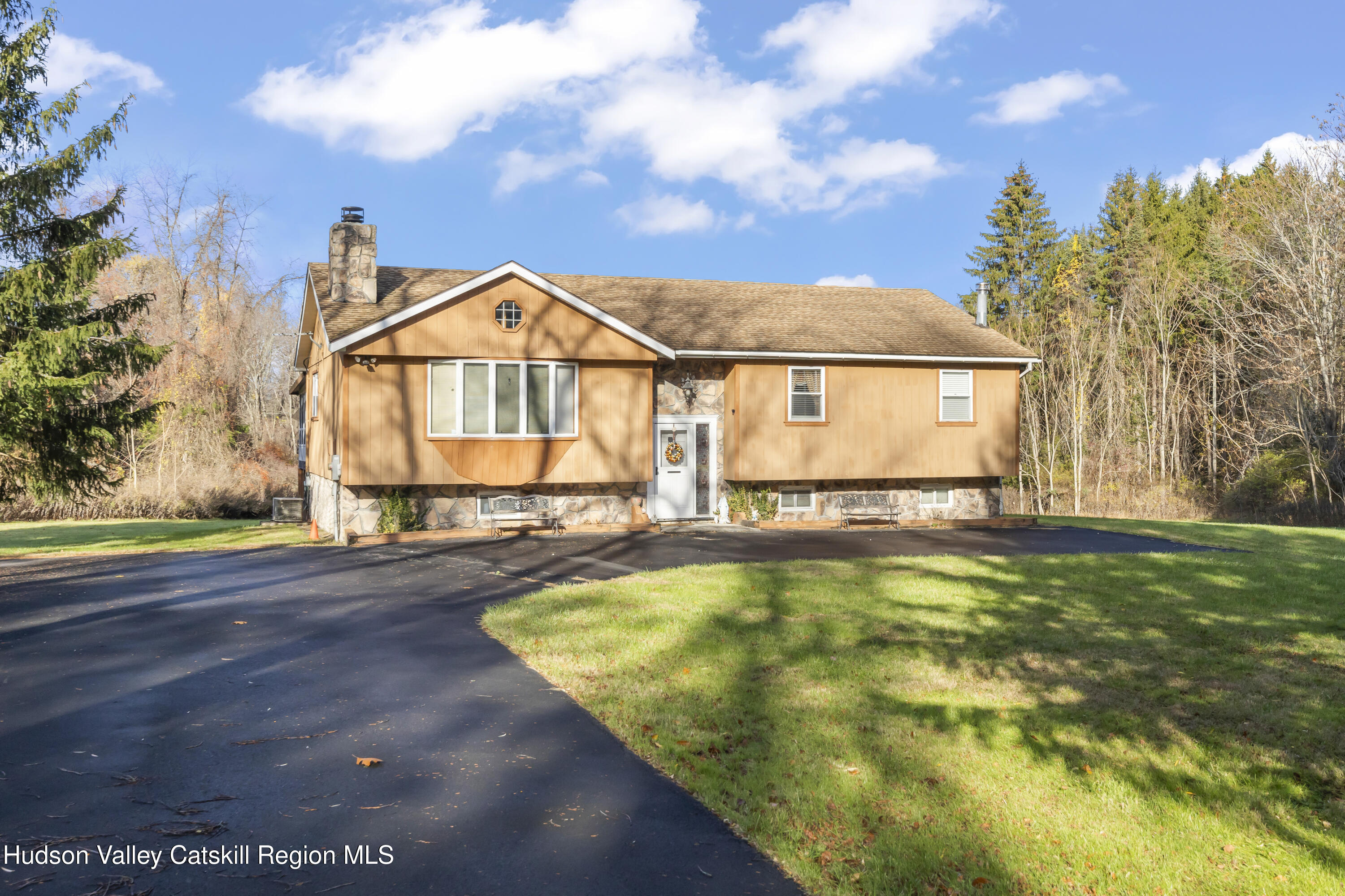 a view of a house with swimming pool