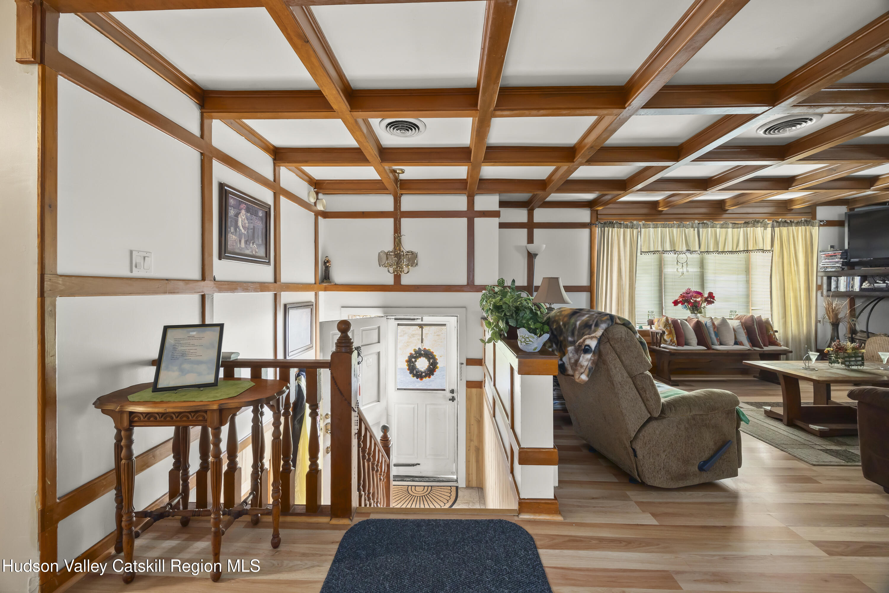 134 Willowbrook Road Hudson, NY 12534 - Photo 13 of 28 a living room with furniture and a floor to ceiling window
