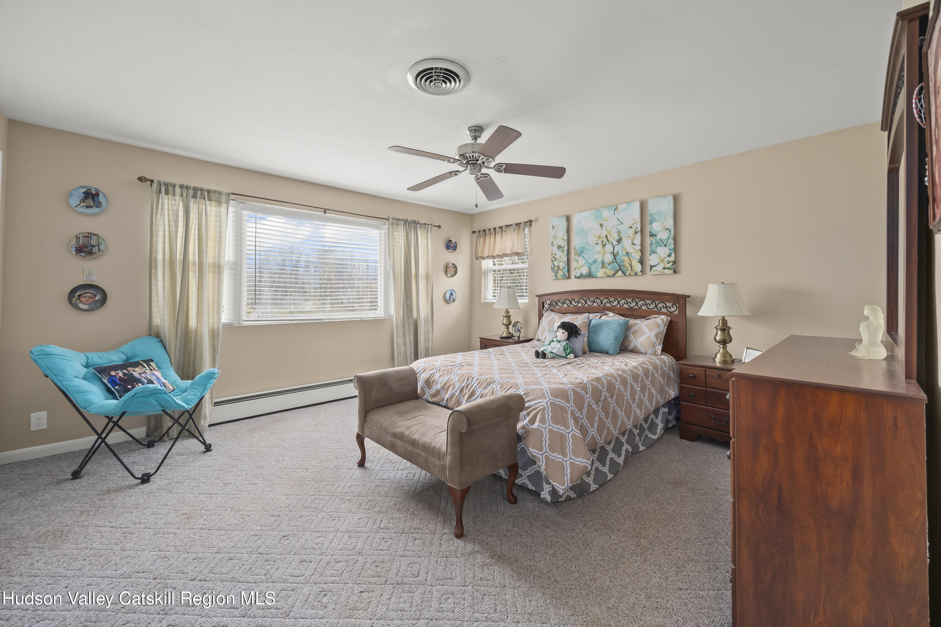 134 Willowbrook Road Hudson, NY 12534 - Photo 15 of 28 a bed sitting in a bedroom next to a window