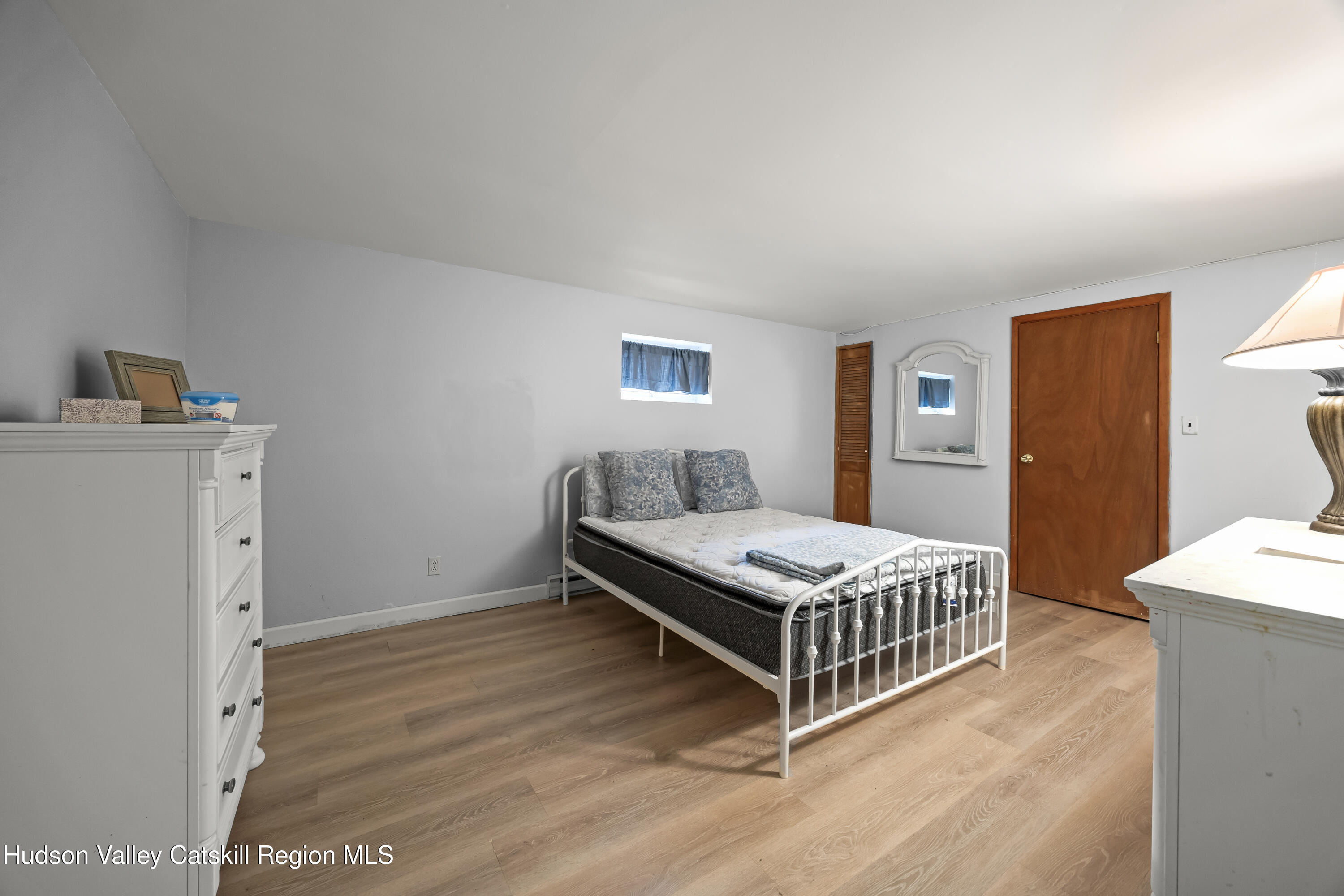 134 Willowbrook Road Hudson, NY 12534 - Photo 20 of 28 a room with a bed and a table in it