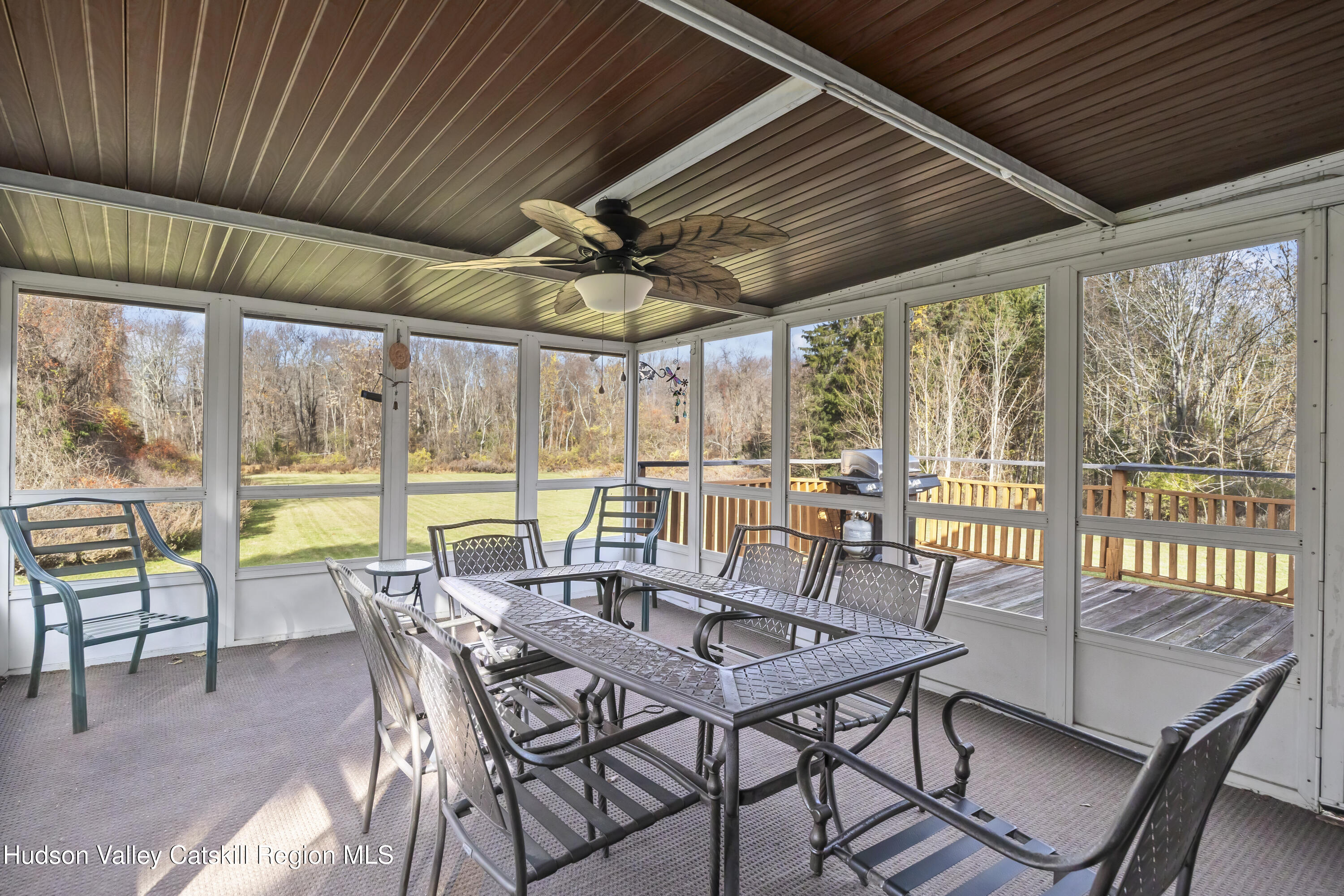 134 Willowbrook Road Hudson, NY 12534 - Photo 23 of 28 a view of a dining room with furniture window and outside view