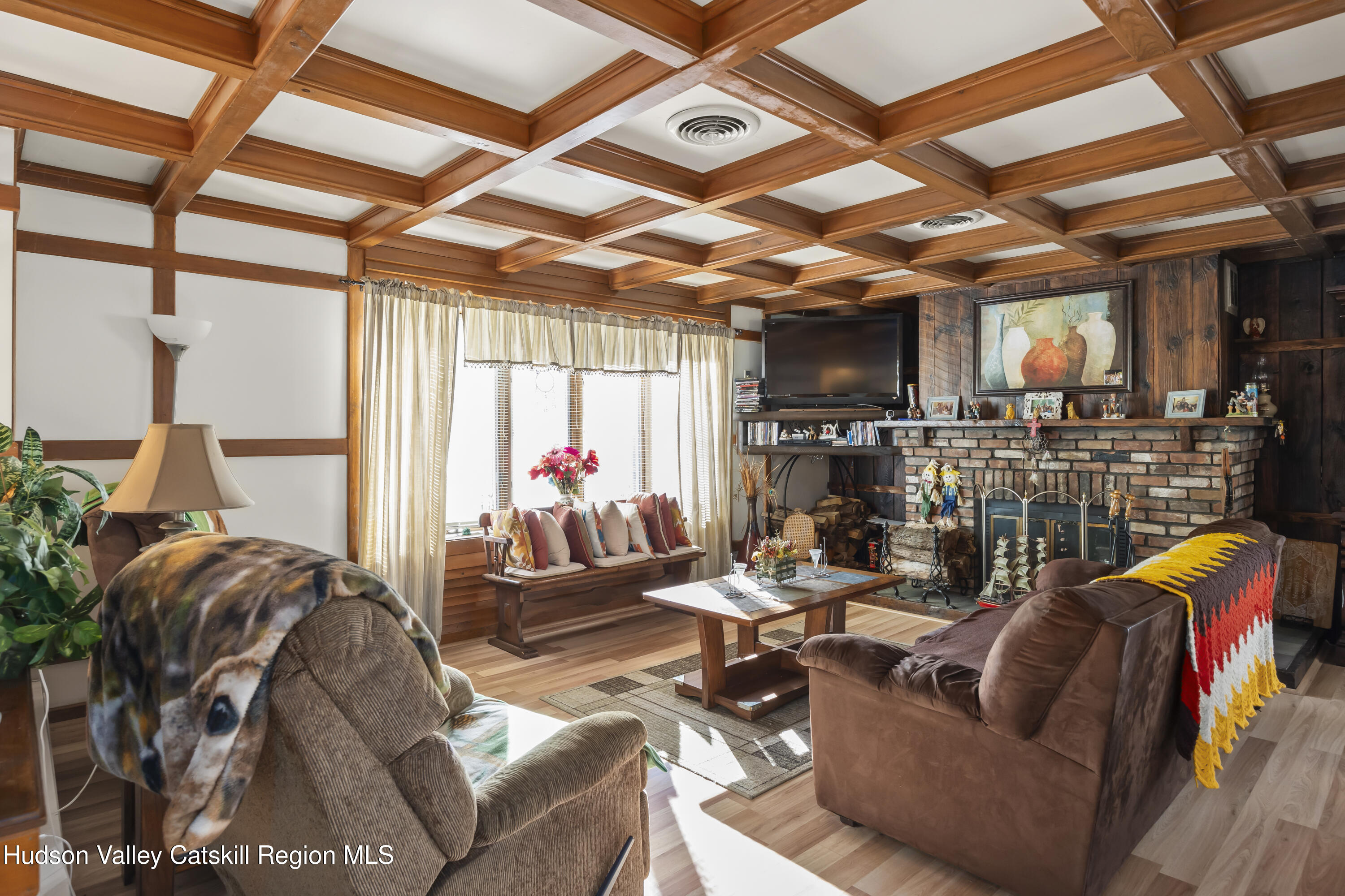 134 Willowbrook Road Hudson, NY 12534 - Photo 4 of 28 a living room with furniture and a flat screen tv