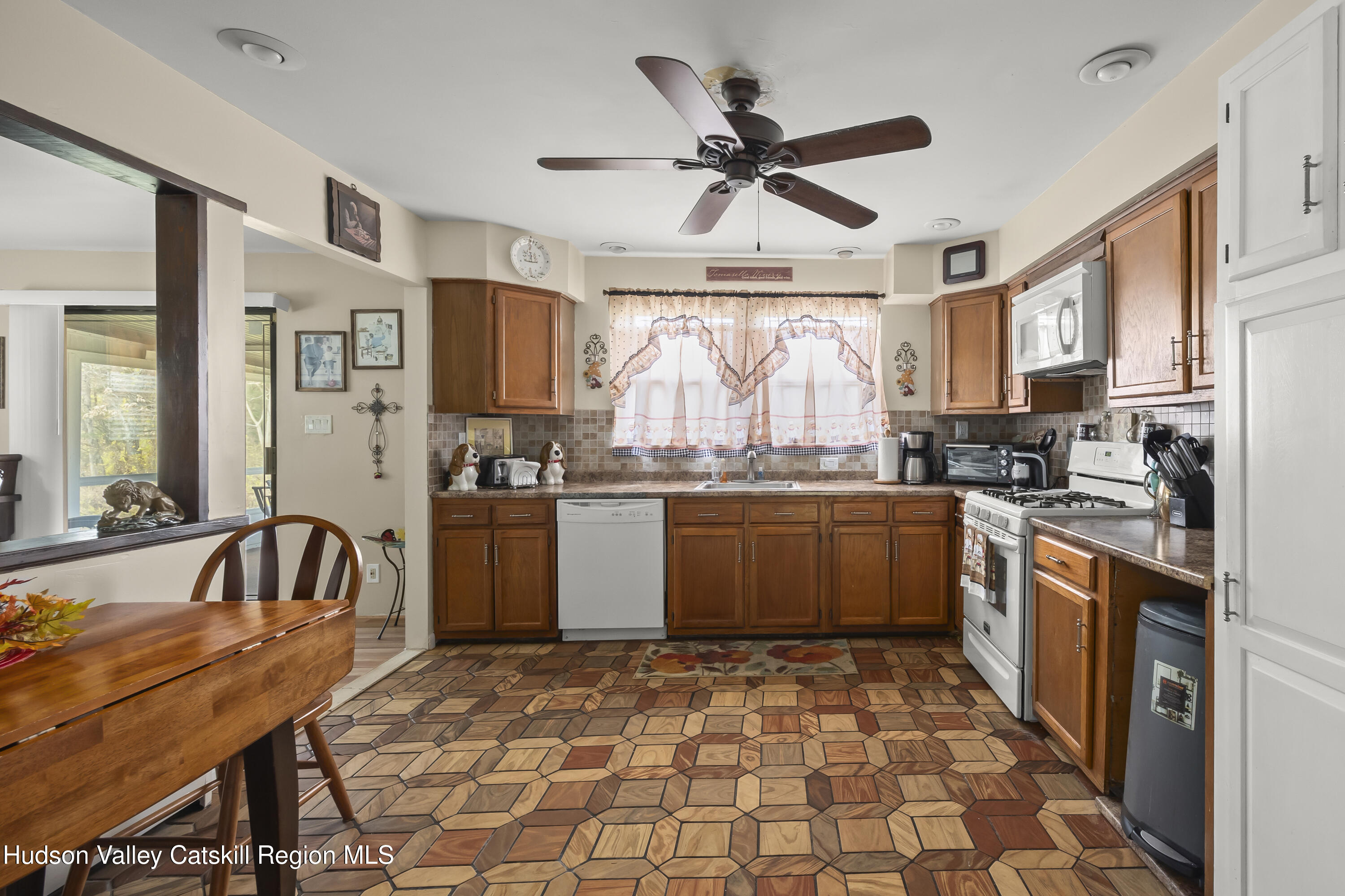 134 Willowbrook Road Hudson, NY 12534 - Photo 9 of 28 a kitchen with stainless steel appliances granite countertop a sink and cabinets