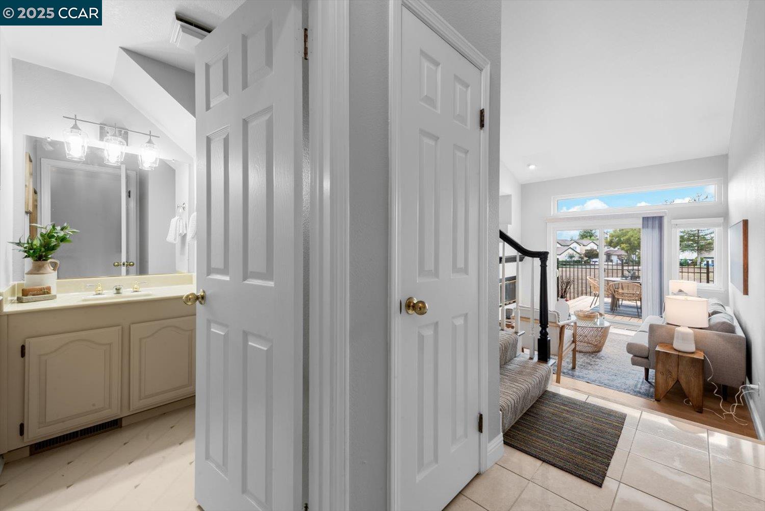 a bathroom with a double vanity sink and mirror