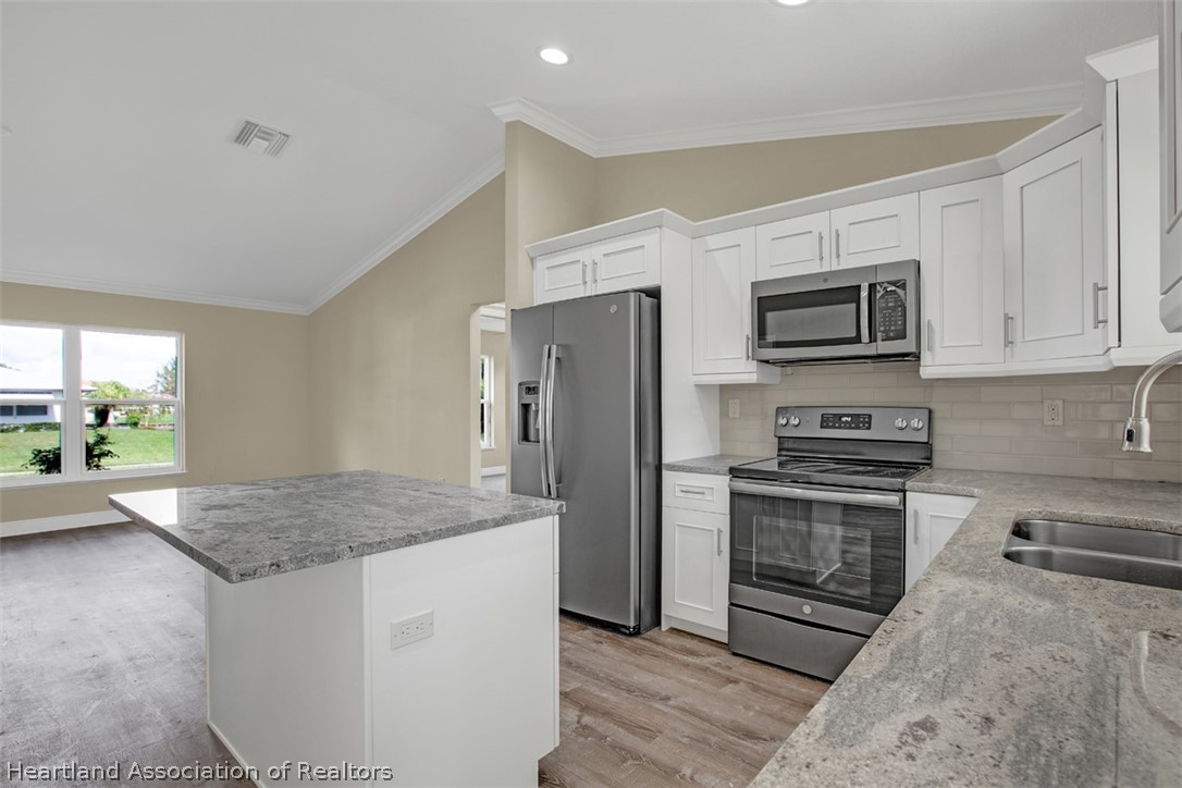 129 Loquat Road Northeast Lake Placid, FL 33852 - Photo 5 of 35 Gallery Image 5
