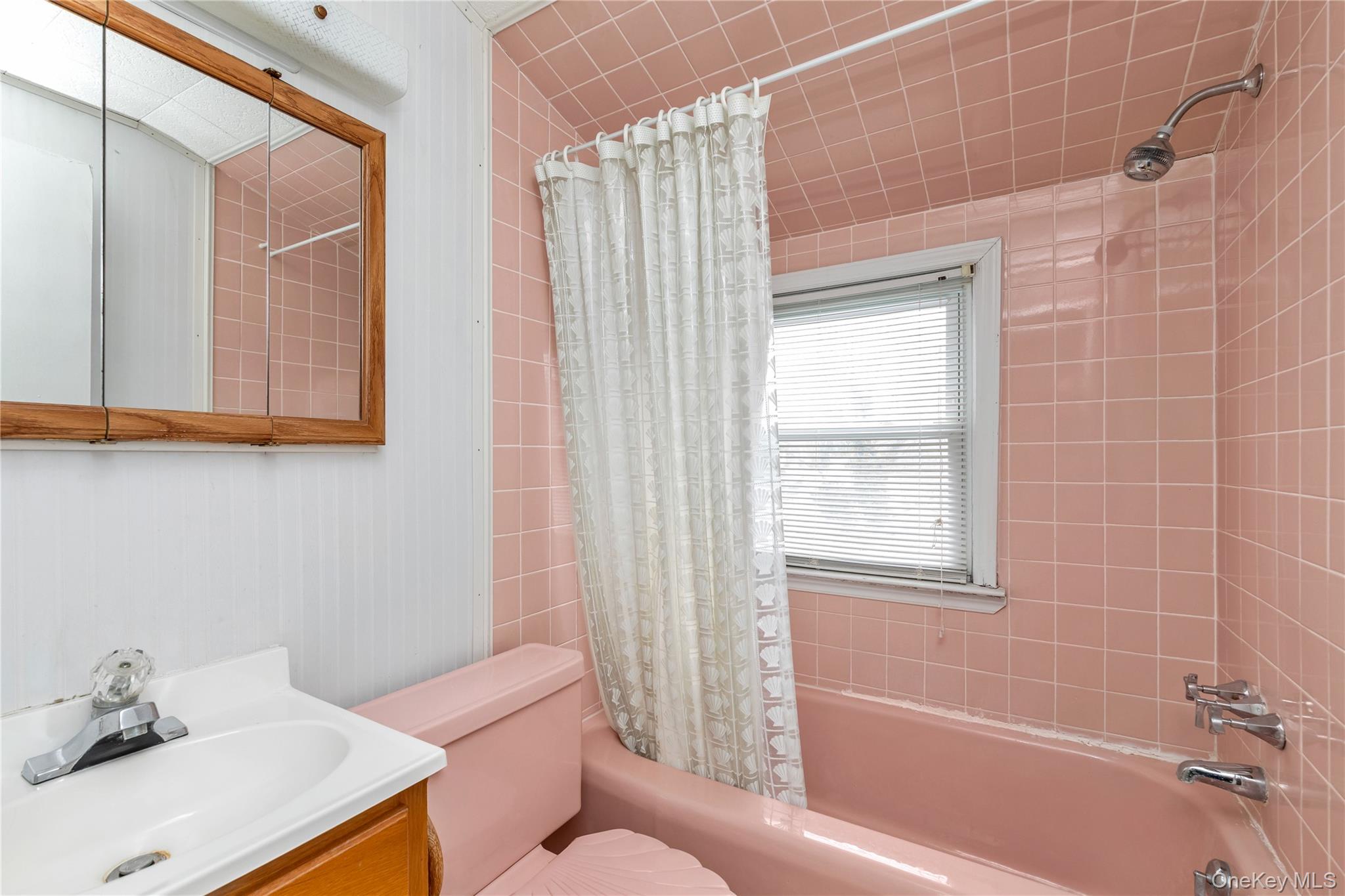 104 Vesper Court Babylon, NY 11702 - Photo 16 of 16 a bathroom with a sink toilet and shower