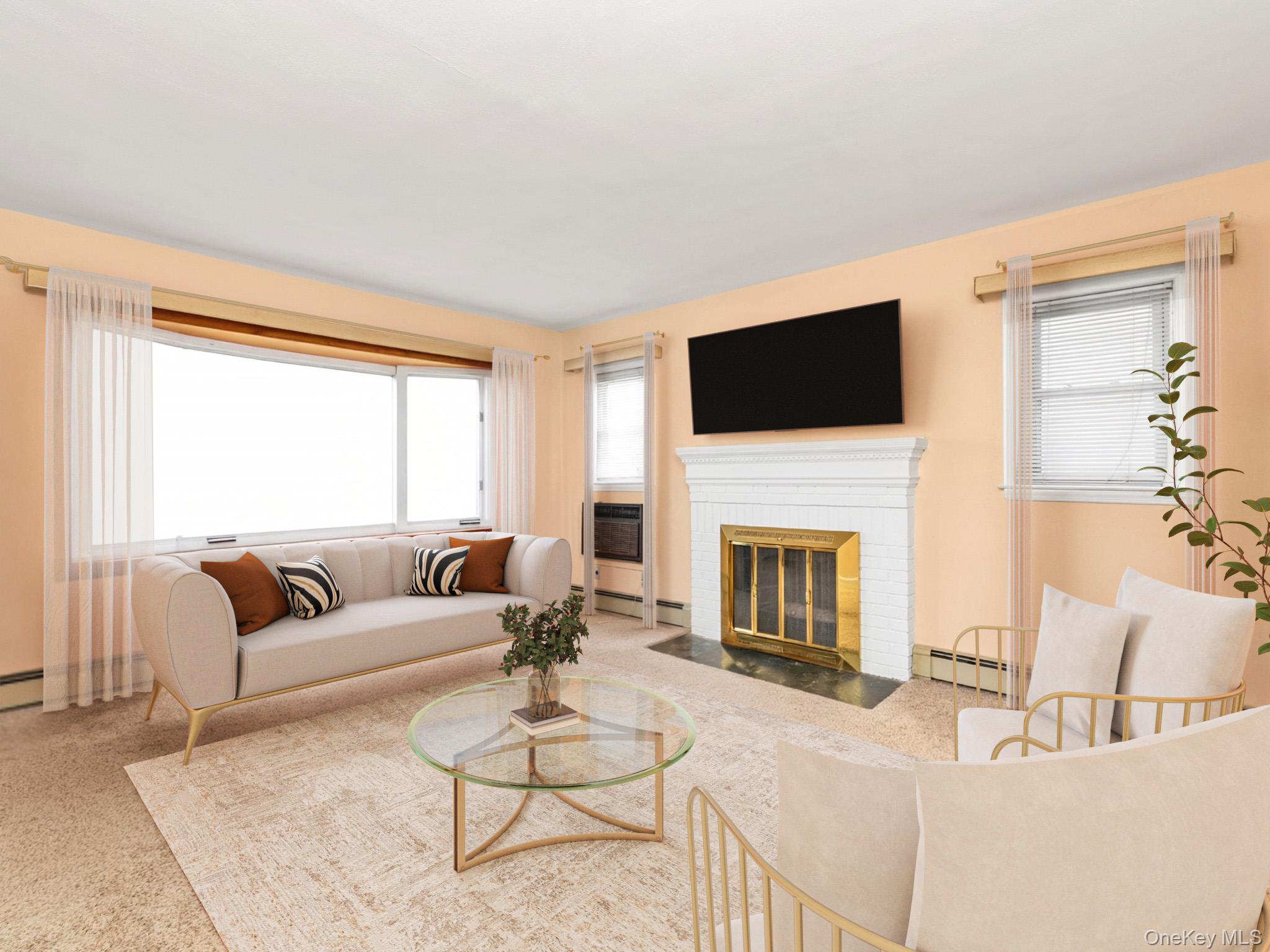 104 Vesper Court Babylon, NY 11702 - Photo 8 of 16 a living room with furniture a fireplace and a flat screen tv