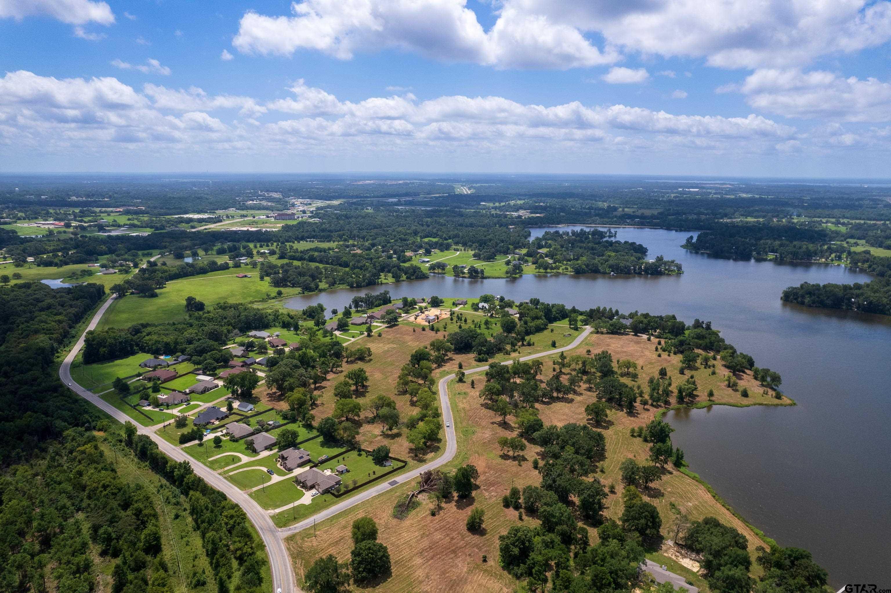 Tbd Lot 8 Tbd Way Mount Pleasant, TX 75455 - Photo 6 of 13 an aerial view of a residential houses with outdoor space