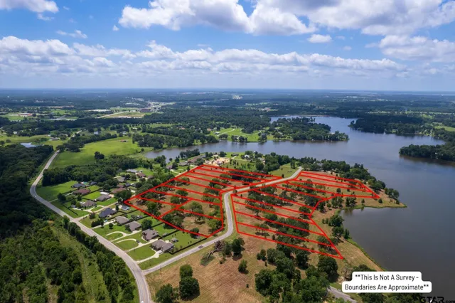 an aerial view of residential houses and outdoor space