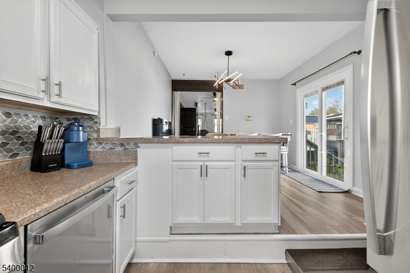 348 Broad Street Mount Holly, NJ 08060 - Photo 14 of 30 a kitchen with white cabinets and sink